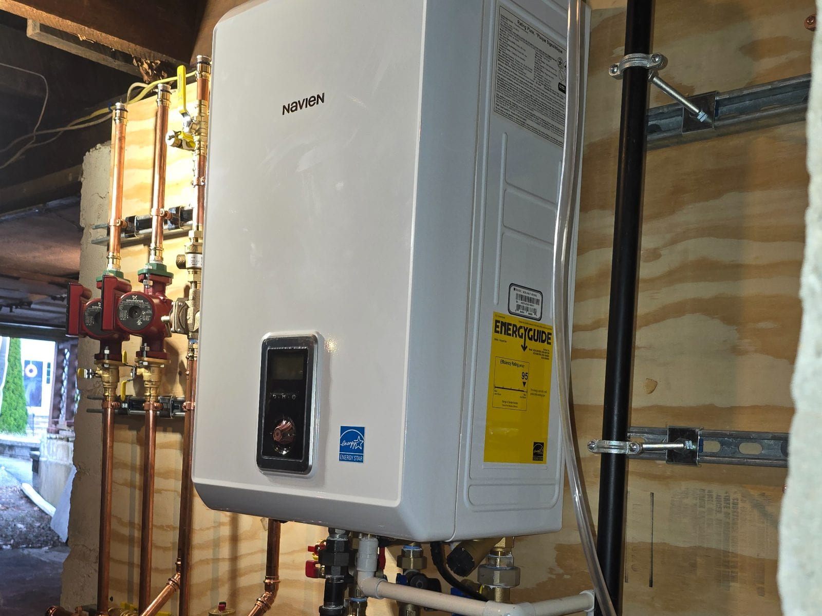 Navien combi boiler installation providing heating and domestic hot water